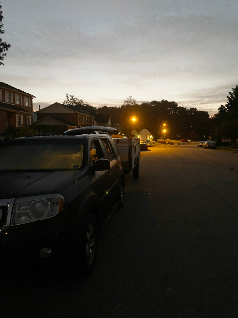 Hooking up the camper in front of my house.